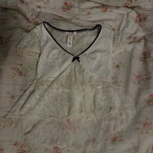 Cream Lace Blouse with Black Trim